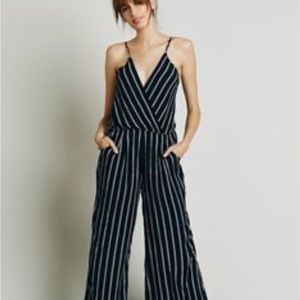 Flynn Skye jumpsuit. Navy and white stripe. Size small